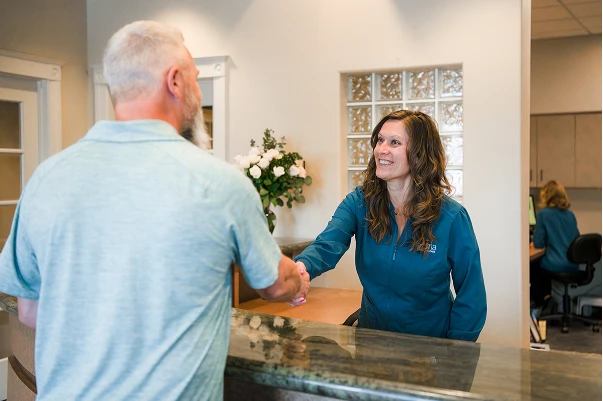 A patient at the front desk