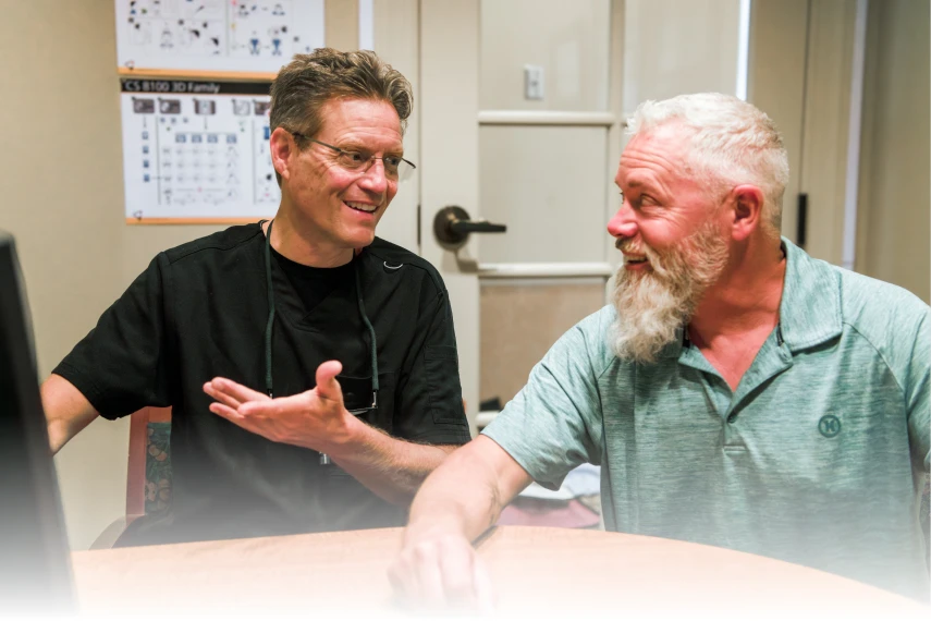 doctor talking to patient