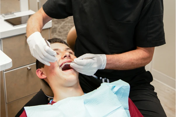 Dr. Johnson working on a patient's teeth
